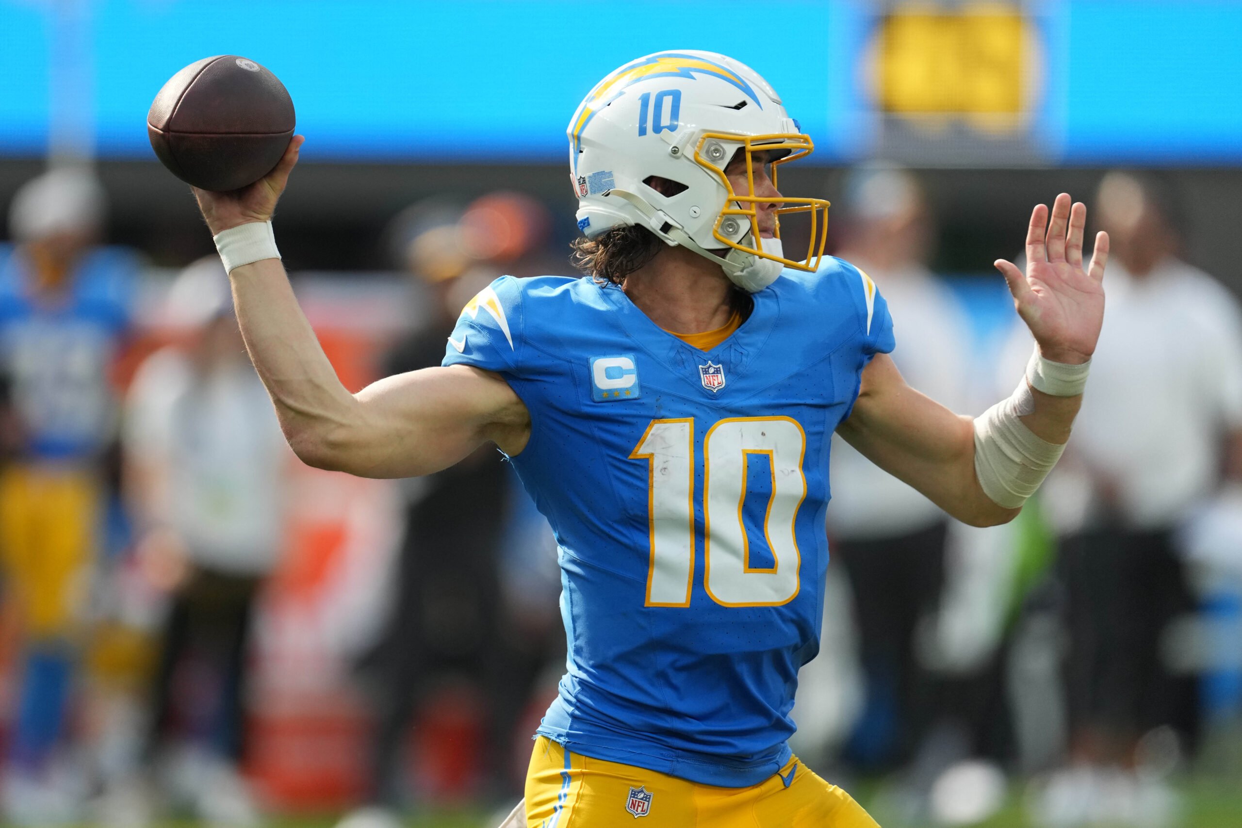 Sep 10, 2023; Inglewood, California, USA; Los Angeles Chargers quarterback Justin Herbert (10) throws the ball against the Miami Dolphins in the second half at SoFi Stadium.