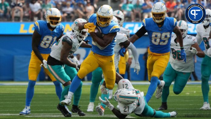 Los Angeles Chargers running back Joshua Kelley (25) carries the ball against the Miami Dolphins.