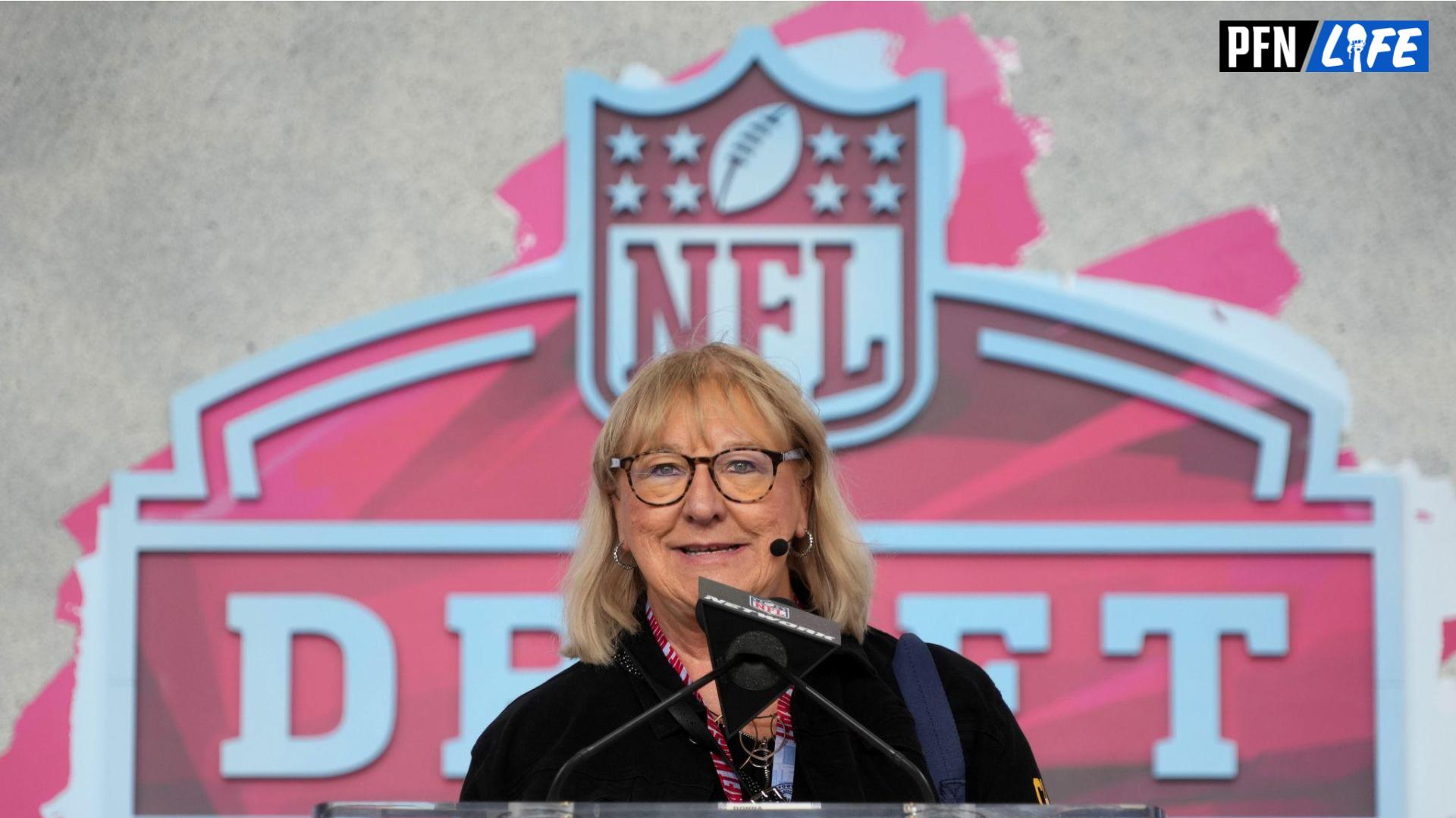 Jason and Travis Kelce's mother, Donna Kelce, presents a pick at the NFL Draft.