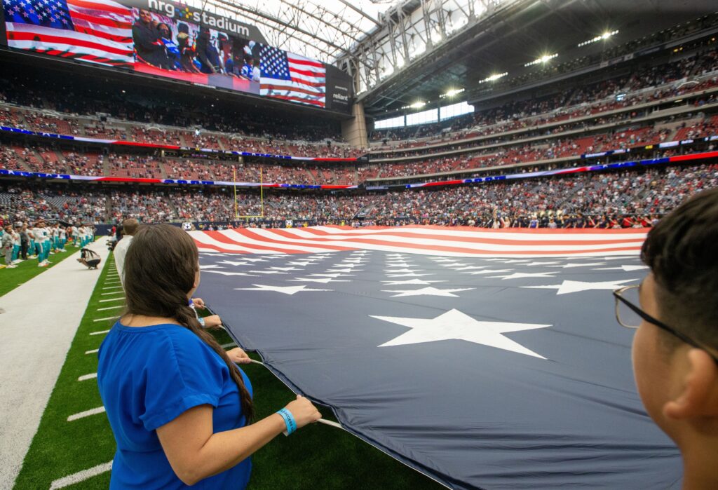 Who sings the National Anthem on Monday Night Football this week?