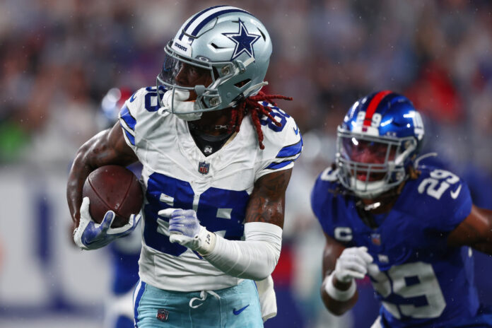 Sep 10, 2023; East Rutherford, New Jersey, USA; Dallas Cowboys wide receiver CeeDee Lamb (88) runs with the ball against the New York Giants during the first half at MetLife Stadium. Mandatory Credit: Ed Mulholland-USA TODAY Sports