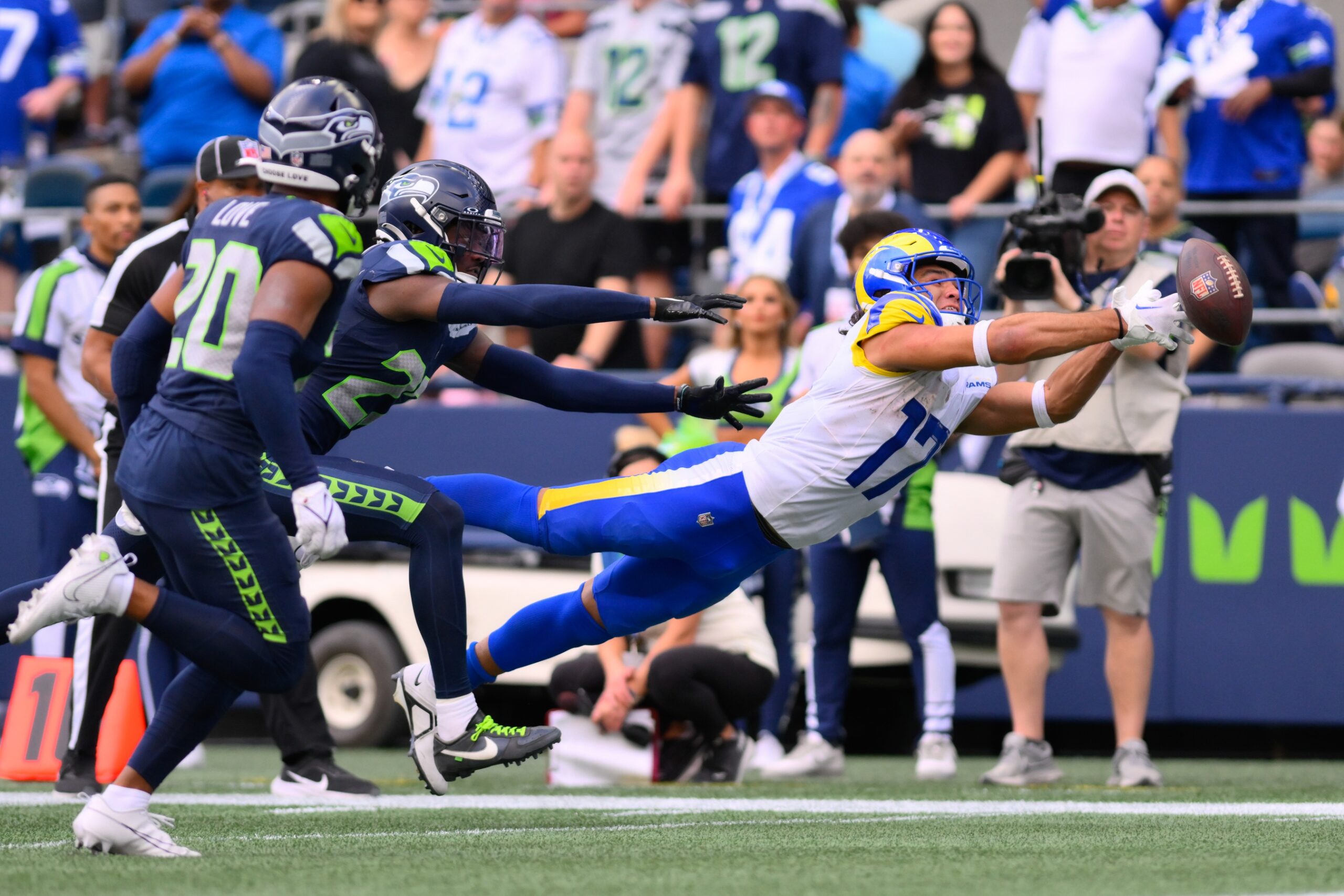 Puka Nacua (17) dives and misses a pass during the second half against the Seattle Seahawks at Lumen Field.