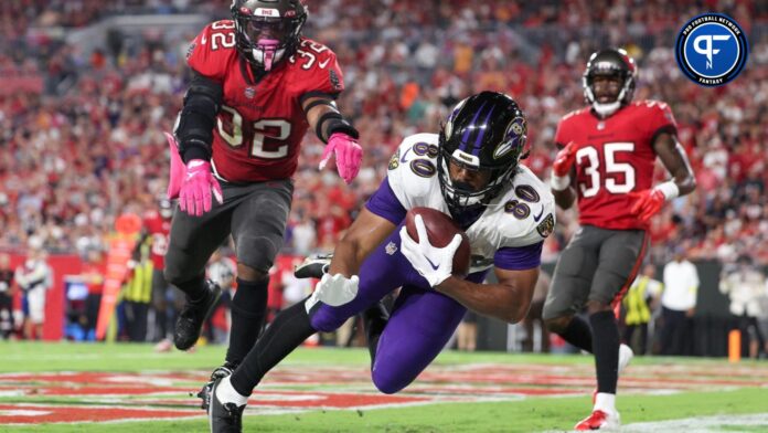 Baltimore Ravens tight end Isaiah Likely (80) catches a pass for a touchdown against the Tampa Bay Buccaneers in the third quarter at Raymond James Stadium.