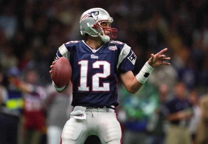 Tom Brady (12) in action against the St. Louis Rams during Super Bowl XXXVI at the Superdome. The Patriots defeated the Rams 20-17 and Brady was named the games most valuable player.