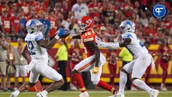 Detroit Lions safety Brian Branch (32) intercepts a pass intended for Kansas City Chiefs wide receiver Kadarius Toney (19) during the second half at GEHA Field at Arrowhead Stadium.