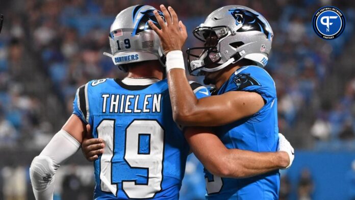 Adam Thielen (19) celebrates with quarterback Bryce Young (9) after scoring a touchdown in the first quarter at Bank of America Stadium.