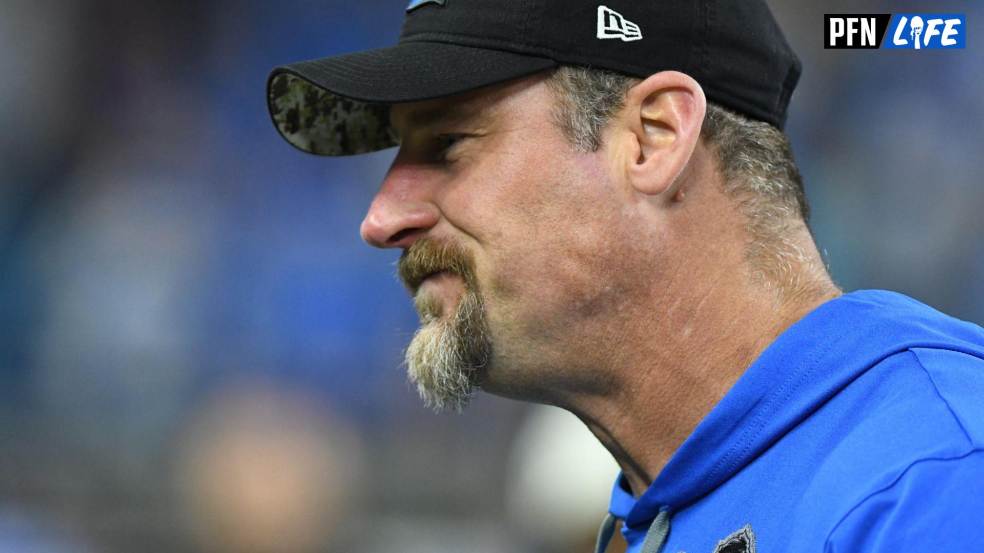 Detroit Lions head coach Dan Campbell talks with members of the Ford family (not pictured) on the sidelines before their game against the Jacksonville Jaguars at Ford Field.