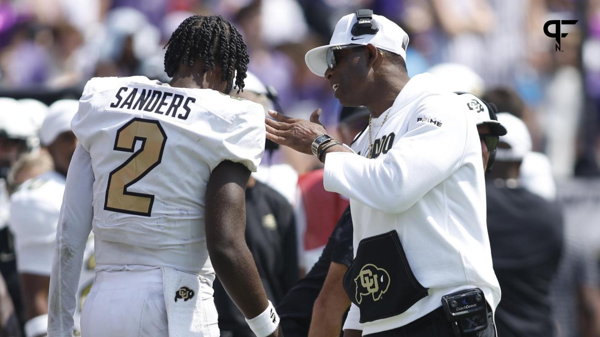 Baltimore Ravens cornerback Deion Sanders lines up against the