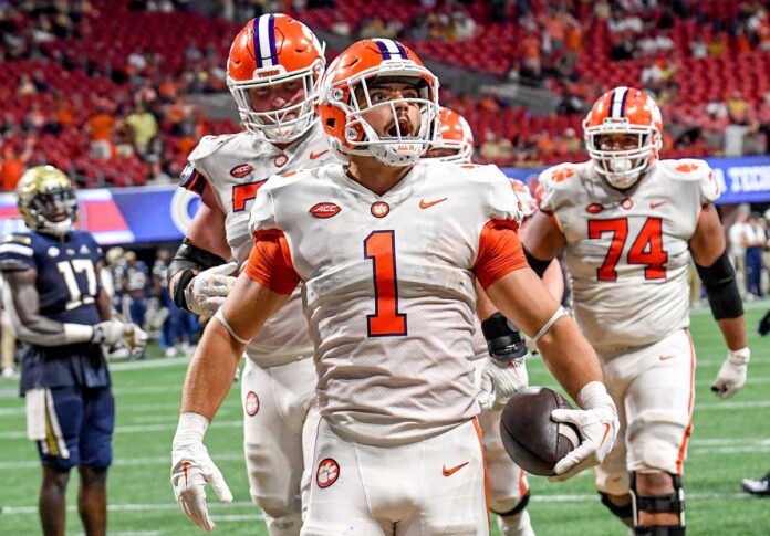 Will Shipley (1) reacts after scoring during the fourth quarter at the Mercedes-Benz Stadium.