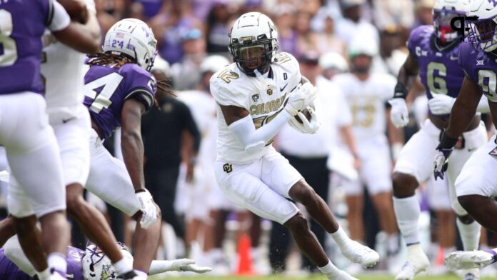 Colorado Buffaloes wide receiver Travis Hunter (12) runs after catching a ball in the first half against the TCU Horned Frogs at Amon G. Carter Stadium.