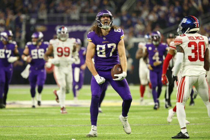 Minnesota Vikings tight end T.J. Hockenson (87) running with the