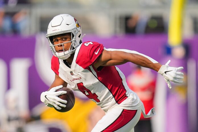Arizona Cardinals wide receiver Rondale Moore (4) runs with the ball against the Minnesota Vikings in the second quarter at U.S. Bank Stadium.