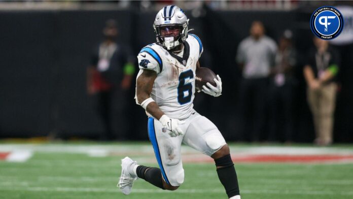 Carolina Panthers running back Miles Sanders (6) runs the ball against the Atlanta Falcons in the second half at Mercedes-Benz Stadium.
