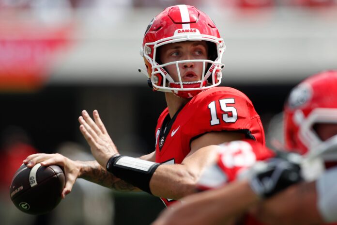 Georgia quarterback Carson Beck (15) looks to throw a pass during the first half of a NCAA college football game against Ball State in Athens, Ga., on Saturday, Sept. 9, 2023.