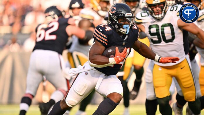 Khalil Herbert (24) runs with the ball against the Green Bay Packers at Soldier Field.