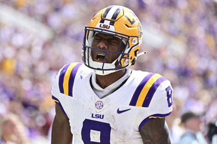 LSU Tigers WR Malik Nabers (8) reacts after a touchdown.