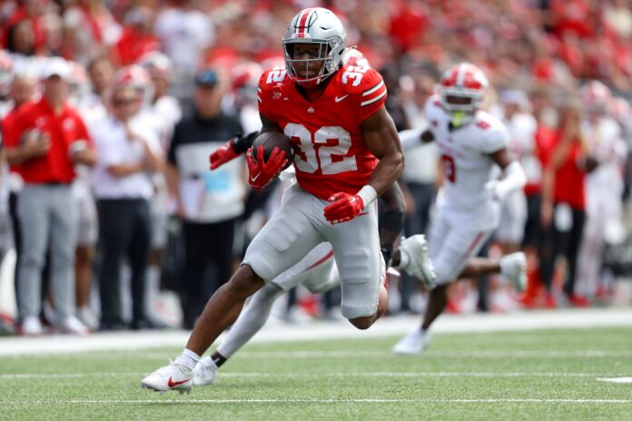 Ohio State Buckeyes RB TreVeyon Henderson (32) runs for a touchdown.