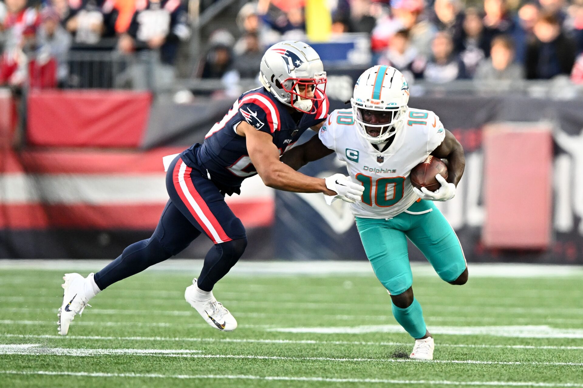 What Channel Is the NFL Game Tonight? Dolphins and Patriots Face Off in an  AFC East Battle on Sunday Night Football