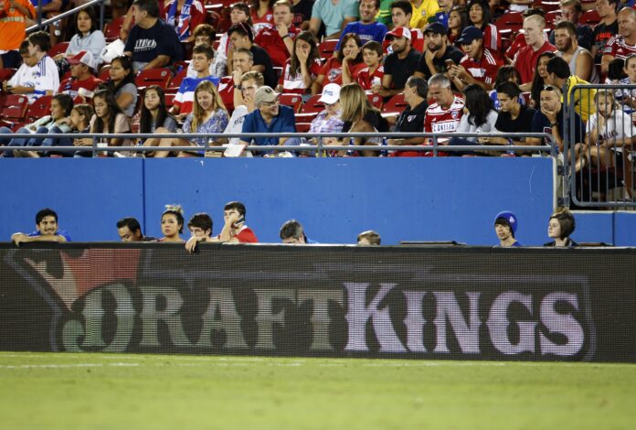A general view of the DraftKings sign board during a soccer match.