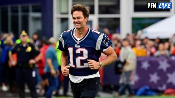 New England Patriots former quarterback Tom Brady runs on the field during a halftime ceremony in his honor during the game between the Philadelphia Eagles and New England Patriots at Gillette Stadium.