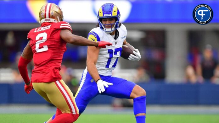 Los Angeles Rams wide receiver Puka Nacua (17) runs the ball against San Francisco 49ers cornerback Deommodore Lenoir (2) during the first half at SoFi Stadium.