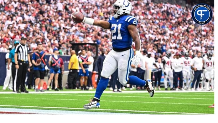 Sep 17, 2023; Houston, Texas, USA; Indianapolis Colts running back Zack Moss (21) runs the ball in for a touchdown during the second quarter against the Houston Texans at NRG Stadium.