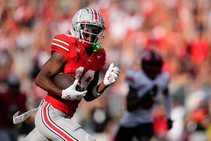 Ohio State Buckeye WR Marvin Harrison Jr. catches pass vs. the Western Kentucky Hilltoppers.