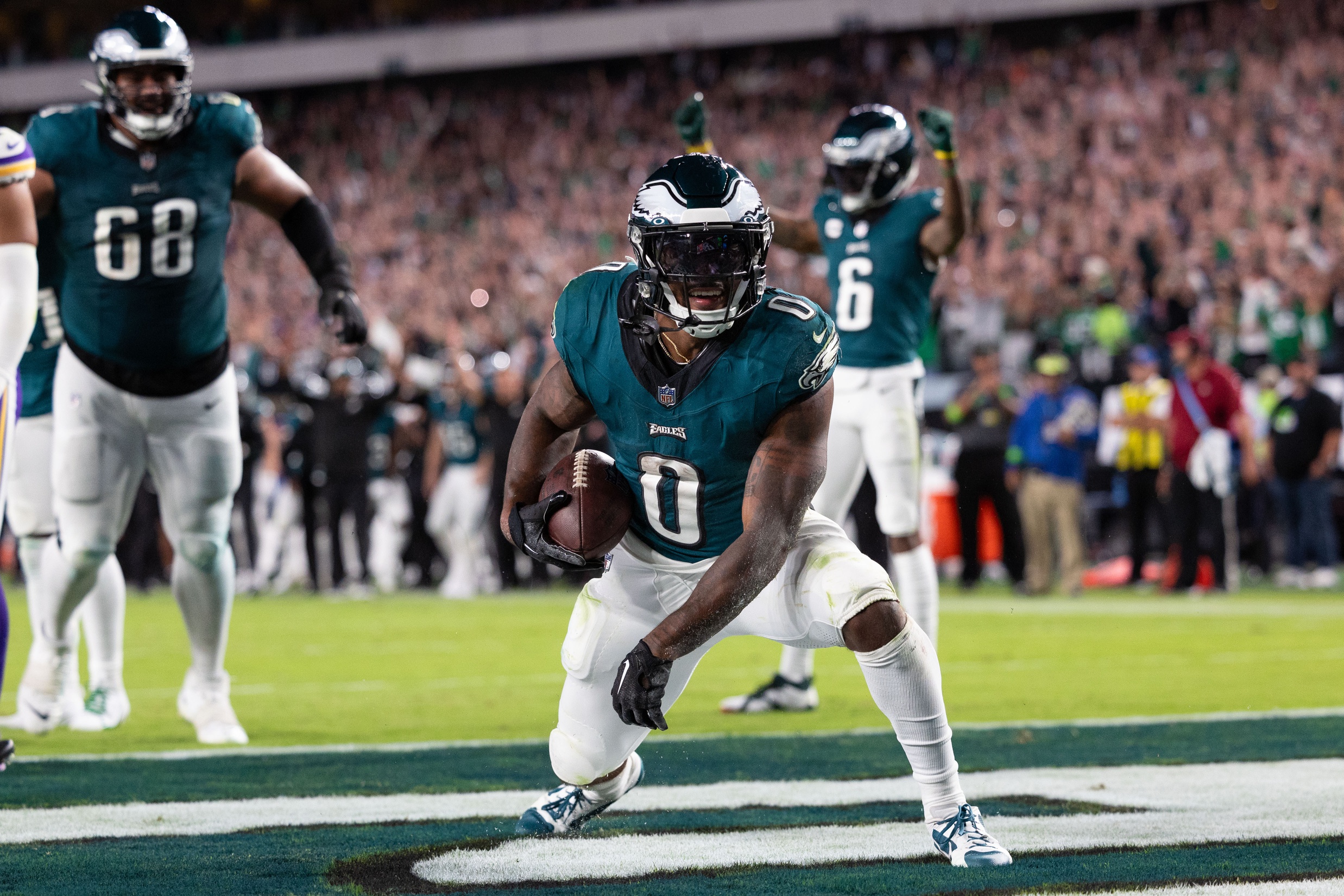 D'Andre Swift (0) celebrates his touchdown against the Minnesota Vikings during the fourth quarter at Lincoln Financial Field.