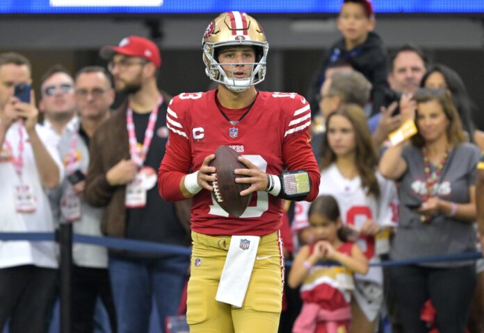 San Francisco 49ers QB Brock Purdy warms up before game vs. Los Angeles Rams.