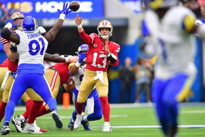 San Francisco 49ers QB Brock Purdy (13) throws a pass against the Los Angeles Rams.