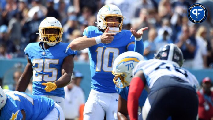 Los Angeles Chargers quarterback Justin Herbert (10) calls plays at the line during the second half against the Tennessee Titans at Nissan Stadium.