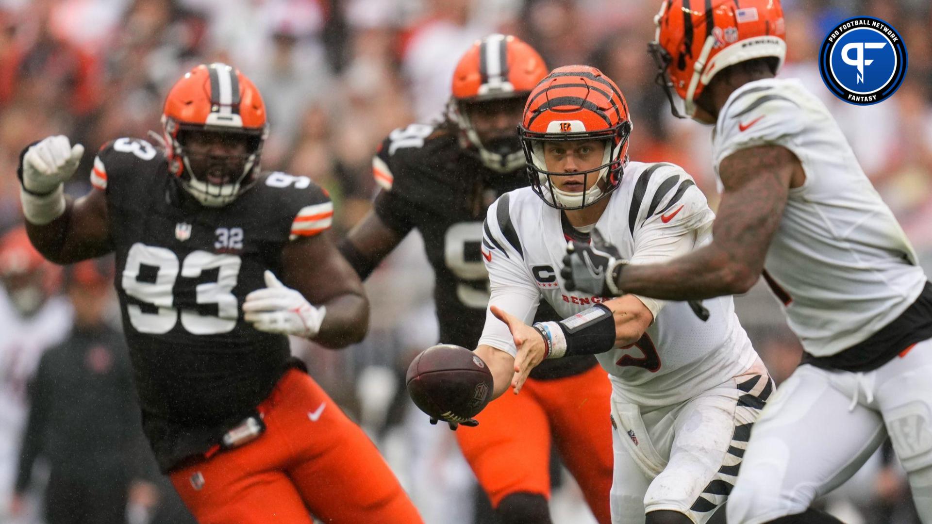 Cincinnati Bengals quarterback giving the ball to receiver Ja'Marr Chase against the Cleveland Browns.