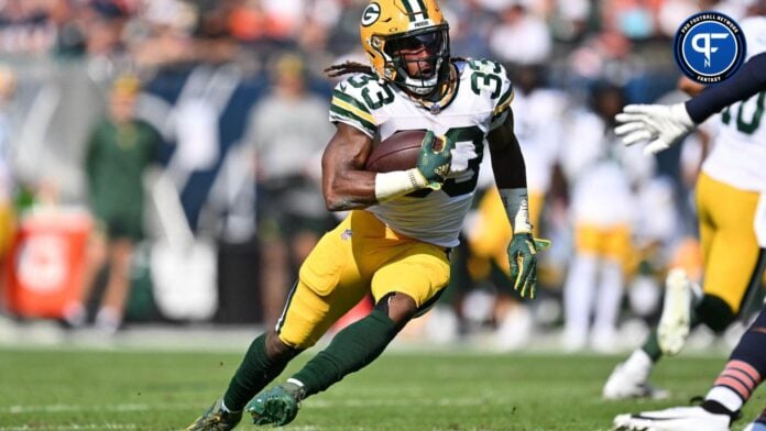 Green Bay Packers RB Aaron Jones (33) runs the ball against the Chicago Bears.