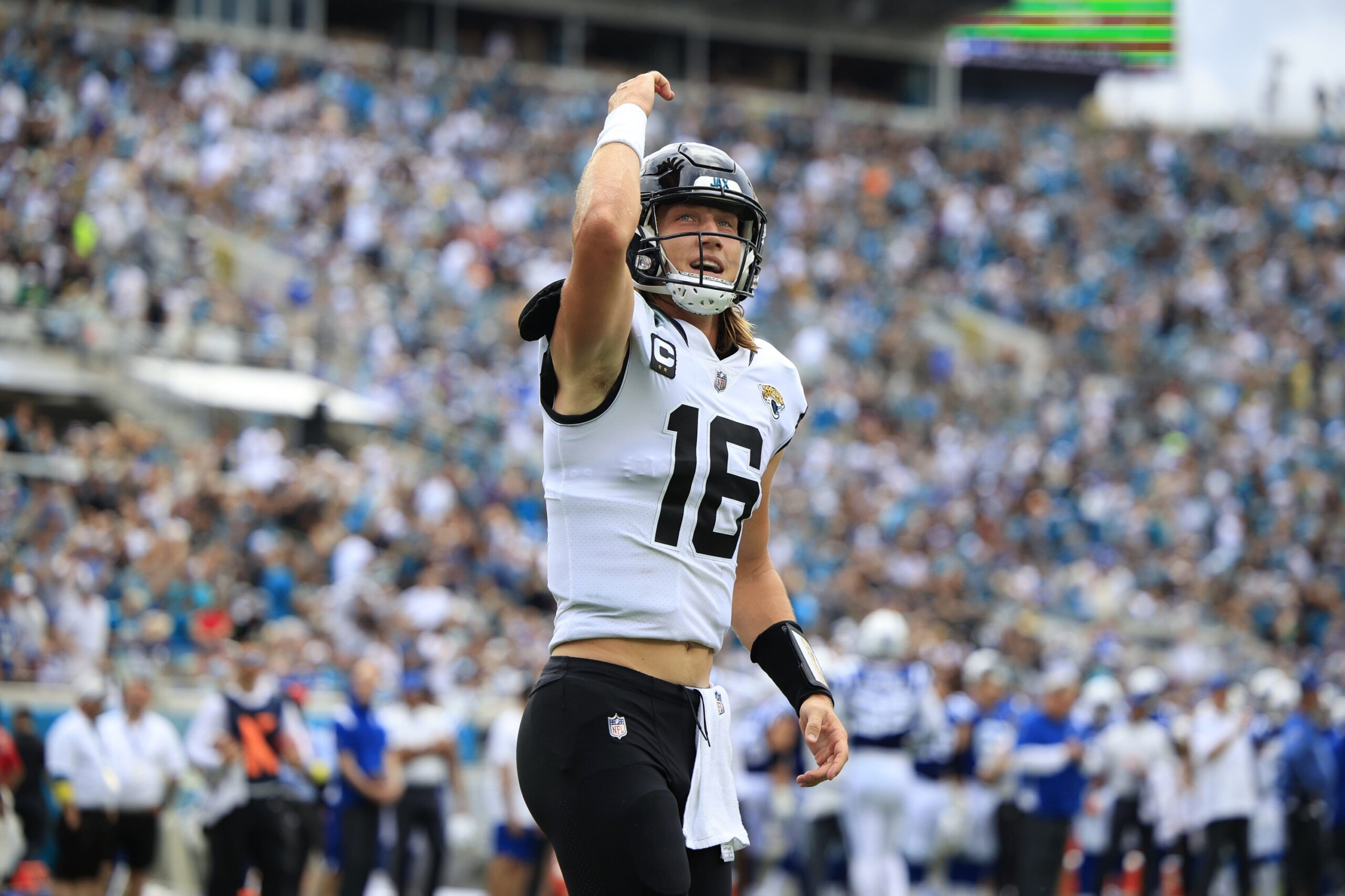 Trevor Lawrence (16) pumps up the crowd after throwing a touchdown pass during the third quarter Sunday, Sept. 18, 2022 at TIAA Bank Field in Jacksonville.