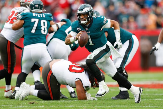 Philadelphia Eagles QB Jalen Hurts (1) takes off with the ball against the Tampa Bay Buccaneers.