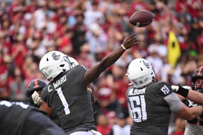Washington State Cougars quarterback Cameron Ward (1) throws a pass against the Oregon State Beavers in the first half at Gesa Field at Martin Stadium.