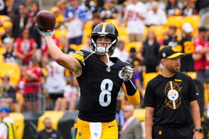 Pittsburgh Steelers quarterback Kenny Pickett (8) warms up before