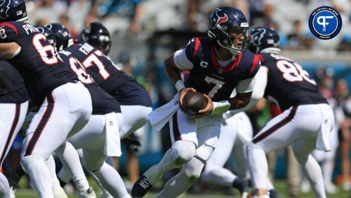 Houston Texans quarterback C.J. Stroud (7) looks to handoff during the third quarter of an NFL football matchup Sunday, Sept. 24, 2023 at EverBank Stadium in Jacksonville, Fla.