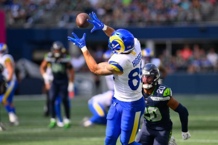 Los Angeles Rams tight end Tyler Higbee (89) catches a pass over Seattle Seahawks safety Julian Love (20) during the second half at Lumen Field.