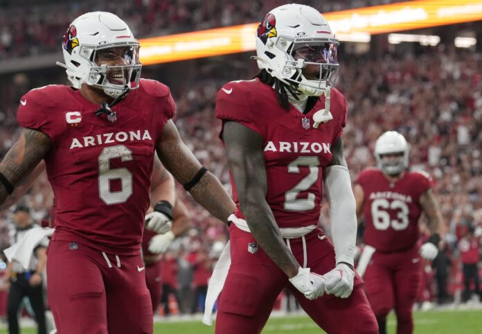 Arizona Cardinals RB James Conner (6) and WR Marquise Brown (2) celebrate a touchdown against the Dallas Cowboys.