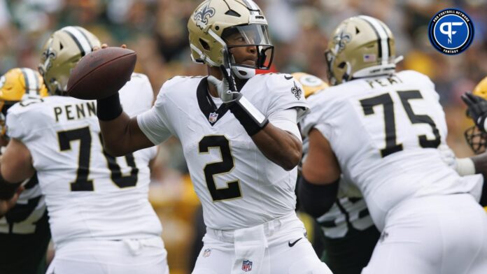 New Orleans Saints quarterback Jameis Winston (2) throws a pass during the third quarter against the Green Bay Packers at Lambeau Field.