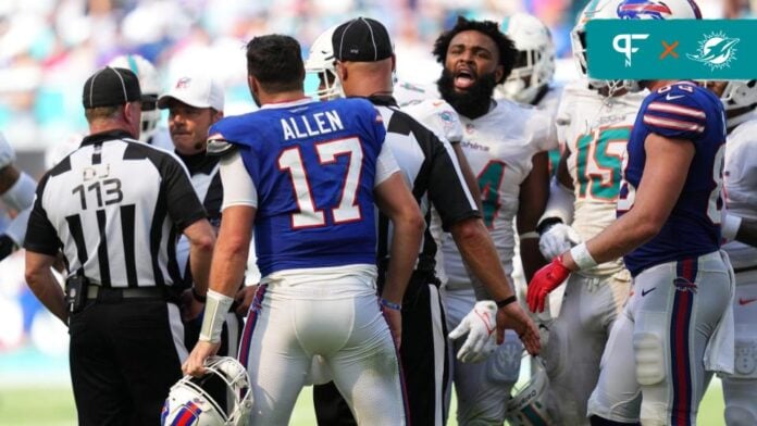 Referees attempt to break up Buffalo Bills QB Josh Allen (17) and Miami Dolphins DT Christian Wilkins (94) after an altercation.
