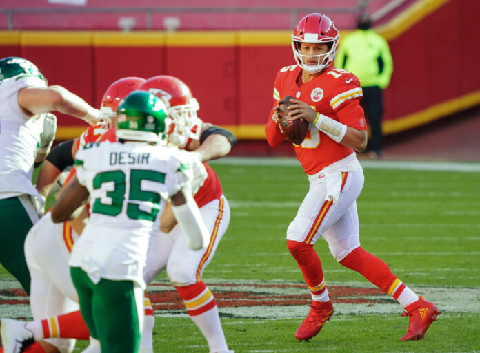 Kansas City Chiefs quarterback Patrick Mahomes (15) drops back to pass against the New York Jets during the second half at Arrowhead Stadium.
