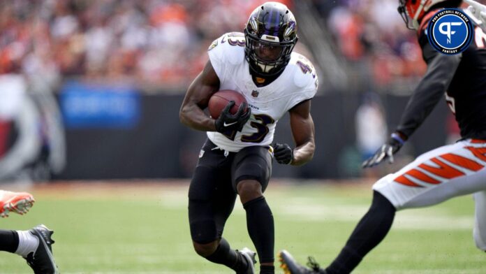 Baltimore Ravens running back Justice Hill (43) carries the ball in the first quarter of a Week 2 NFL football game between the Baltimore Ravens and the Cincinnati Bengals Sunday, Sept. 17, 2023, at Paycor Stadium in Cincinnati.