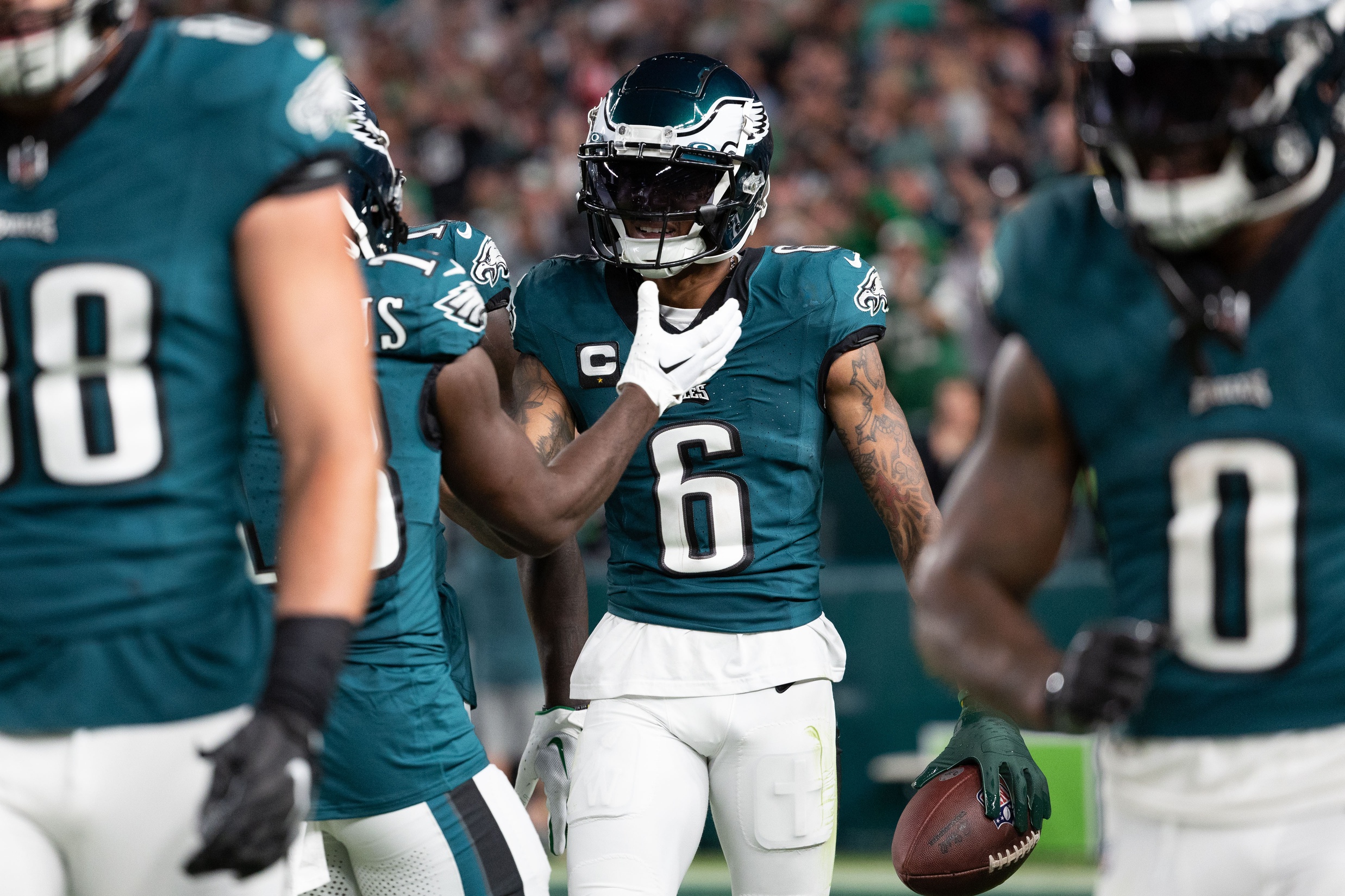 DeVonta Smith (6) celebrates with teammates after his touchdown catch against the Minnesota Vikings during the third quarter at Lincoln Financial Field.