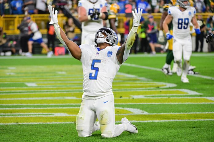 Detroit Lions running back David Montgomery (5) reacts after scoring a touchdown in the second quarter against the Green Bay Packers at Lambeau Field.