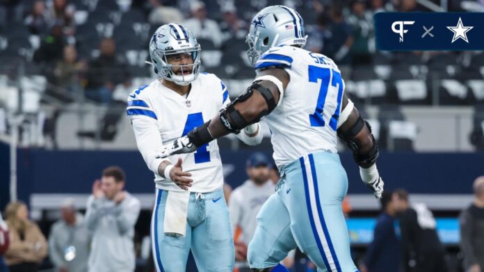 Dak Prescott (4) greets offensive tackle Tyron Smith (77) before the game against the Philadelphia Eagles at AT&T Stadium.