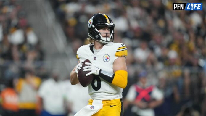 Pittsburgh Steelers quarterback Kenny Pickett (8) throws the ball against the Las Vegas Raiders in the first half at Allegiant Stadium.