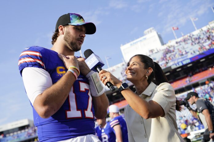 CBS sportscaster Tracy Wolfson interviews Buffalo Bills quarterback Josh Allen (17) after the game against the Miami Dolphins at Highmark Stadium.