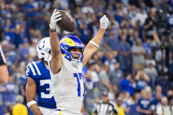 Puka Nacua (17) celebrates his game winning touchdown in the overtime against the Indianapolis Colts at Lucas Oil Stadium.